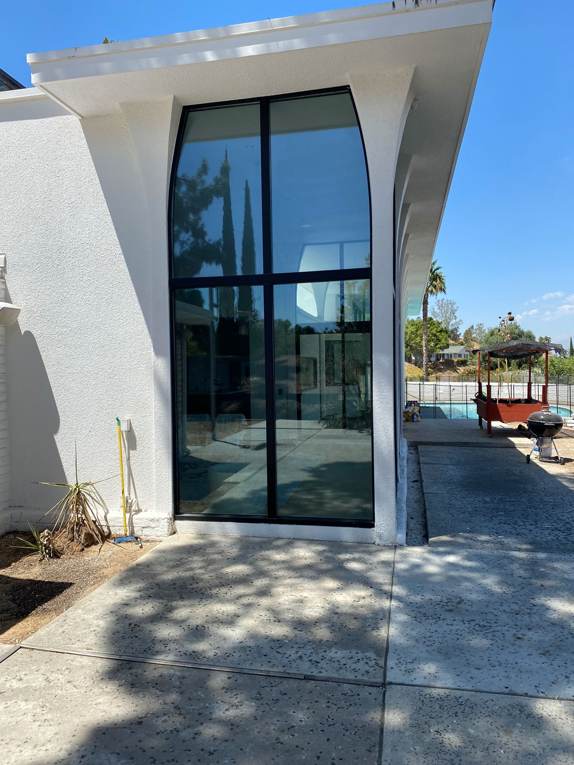 Modern home with tall ceilings and window tint