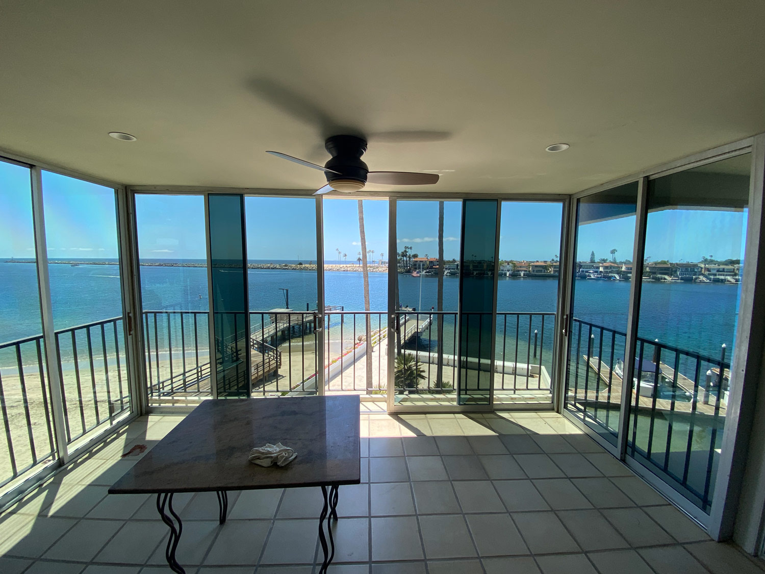 Beach home sliding glass door with window tint